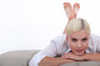 Photo: Woman lying on the bed Woman lying on the bed