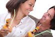 Couple eating fruit