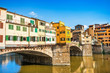 Ponte Vecchio with river Arno in Florence, Italy
