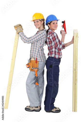 Photo: Two female carpenters Two female carpenters