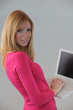 Photo: Redhead using laptop Redhead using laptop