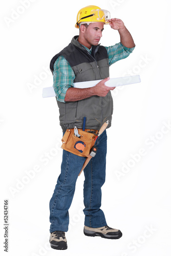 Photo: laborer scratching hi head laborer scratching hi head