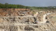 Production of a natural construction stone in an open pit.