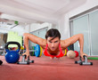 Photo: Crossfit fitness woman push ups pushup exercise Crossfit fitness woman push ups pushup exercise
