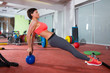 Photo: Crossfit fitness woman push ups kettlebell pushup exercise Crossfit fitness woman push ups kettlebell pushup exercise