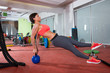 Photo: Crossfit fitness woman push ups kettlebell pushup exercise Crossfit fitness woman push ups kettlebell pushup exercise