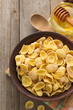 bowl of corn flakes  on wood