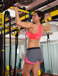 Photo: Crossfit fitness toes to bar man pull-ups 2 bars with TRX Crossfit fitness toes to bar man pull-ups 2 bars with TRX