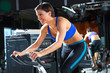 Foto: Aerobics spinning monitor trainer woman at gym Aerobics spinning monitor trainer woman at gym