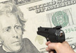 Hand holding gun shooting target with clipping path.