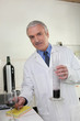 an oenologist writing notes