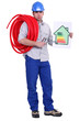 Electrician holding energy rating placard