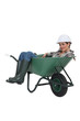 Photo: Woman laying in wheelbarrow Woman laying in wheelbarrow