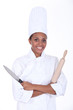 Chef with a rolling pin and knife