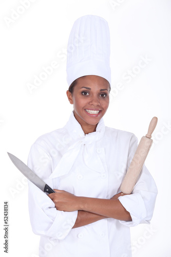 Photo: Chef with a rolling pin and knife Chef with a rolling pin and knife