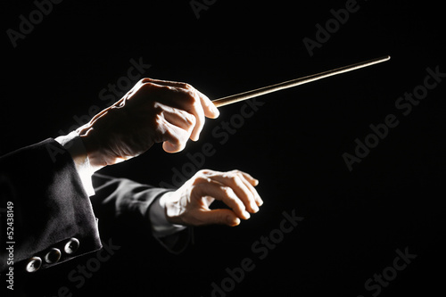 Photo: Orchestra conductor hands baton Orchestra conductor hands baton