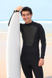 Photo: Brunette with surfboard Brunette with surfboard