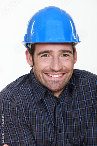 Photo: Happy manual worker. Happy manual worker.