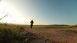 Video: Man hiking through morning field Man hiking through morning field