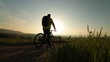 Video: Biker silhouette at sunrise, arms outstretched Biker silhouette at sunrise, arms outstretched