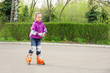 Little girl roller-skating