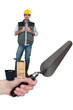 Photo: Bricklayer standing on a hand holding a trowel Bricklayer standing on a hand holding a trowel