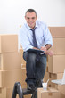 Foto: Man preparing to move Man preparing to move