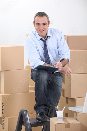 Photo: Man preparing to move Man preparing to move
