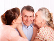 Senior man with her caregiver at home