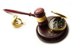 Judge's wooden gavel and compass