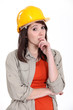 Photo: thoughtful female apprentice thoughtful female apprentice