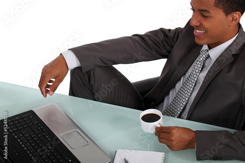 Photo: Afro-American worker having a break Afro-American worker having a break