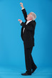 Photo: Businessman reaching upwards Businessman reaching upwards