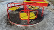 triple baby spinning carousel yellow chairs red rails