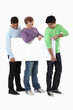 Foto: Three young lads with a blank board Three young lads with a blank board