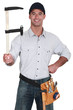 Man holding a clamp