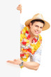 Foto: Smiling man in traditional costume gesturing with his hand on a Smiling man in traditional costume gesturing with his hand on a