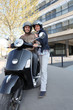 Photo: Couple about to ride scooter Couple about to ride scooter