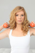 Blonde girl with orange weights