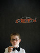Education needs you boy business man with Nascar racing fan car