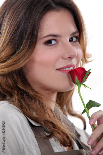Photo: Woman stood with rose Woman stood with rose