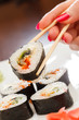 sushi with chopsticks