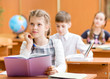schoolkids work at lesson