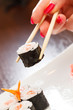 sushi with chopsticks