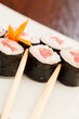 sushi with chopsticks