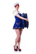 Woman travel attendant with suitcase on white