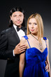 Pair in love in dark studio