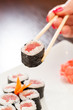 sushi with chopsticks