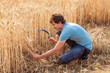 Portrait of smile farmer with sickle