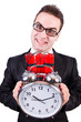 Foto: Man with time bomb isolated on white Man with time bomb isolated on white
